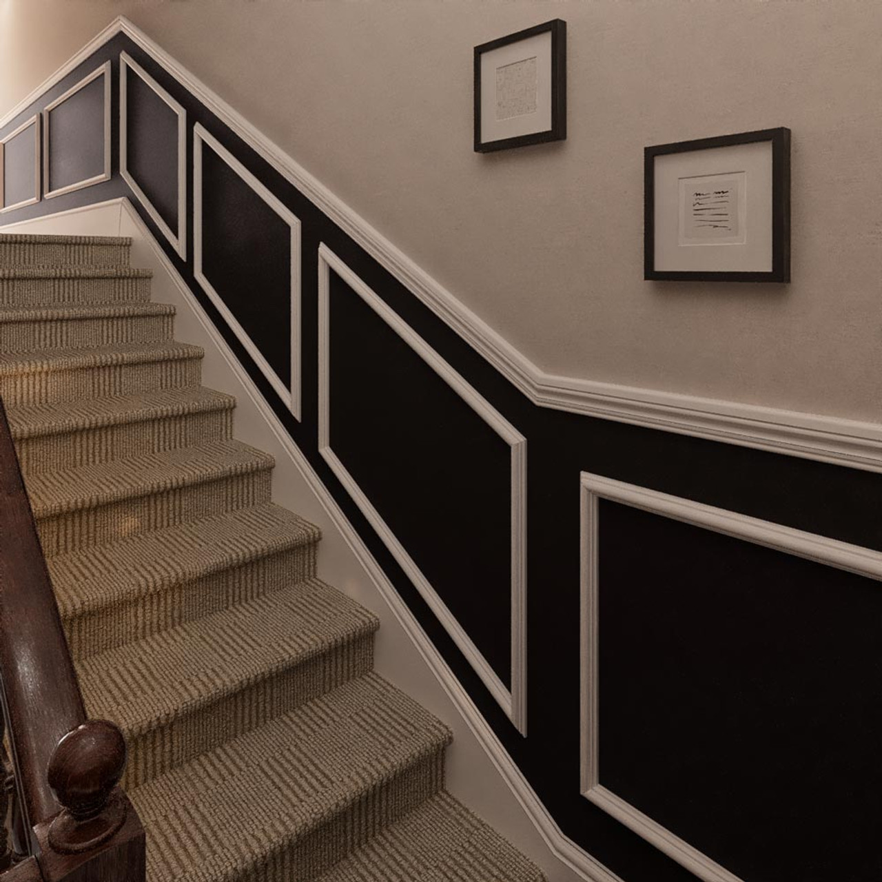 Painted and primed staircase wall panelling