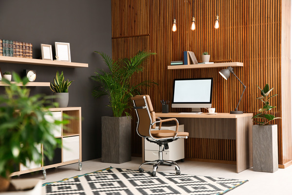 Cozy home office with wooden slats wall