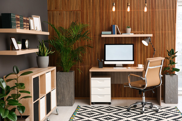 Modern home office with wooden accent wall